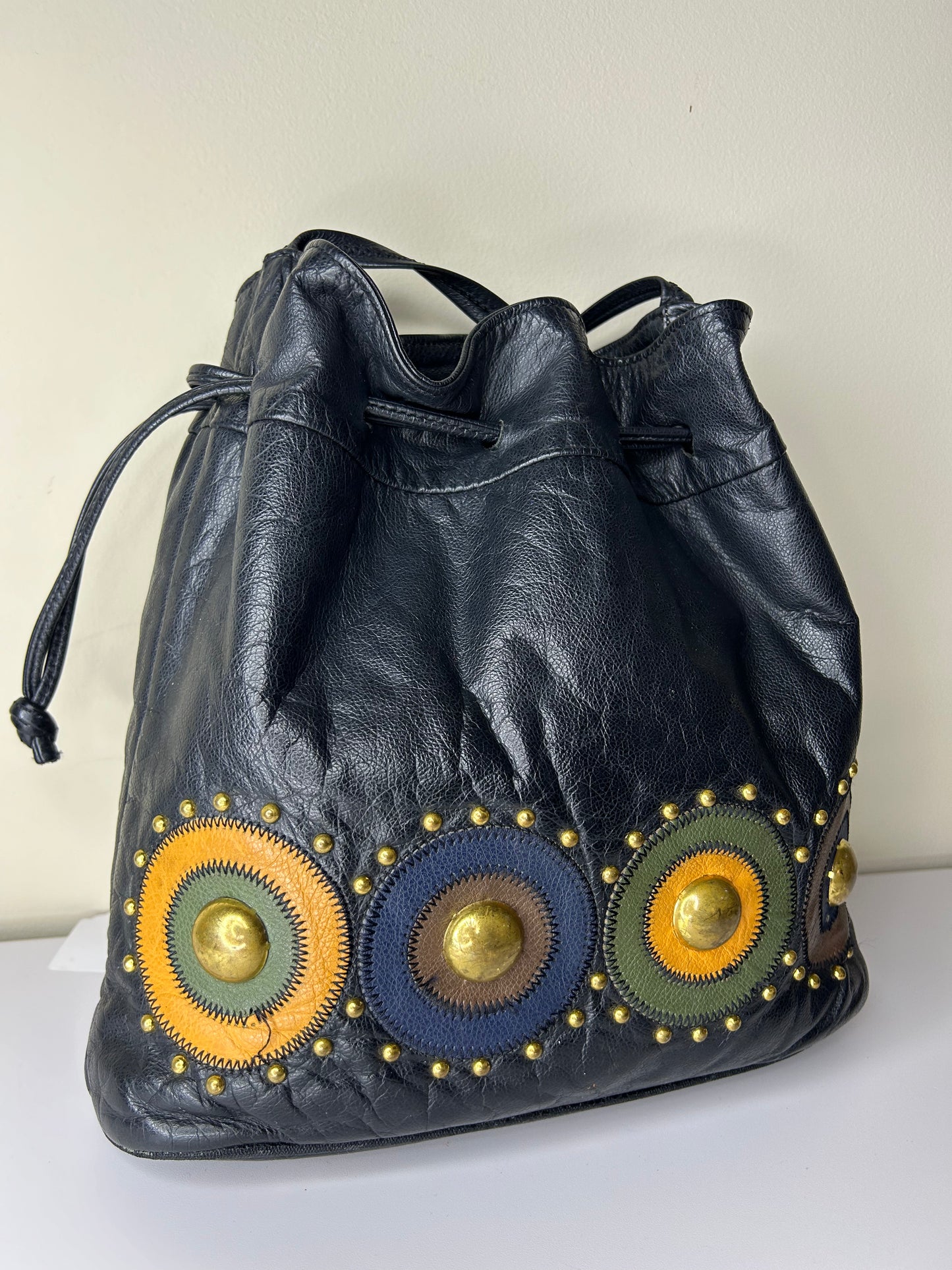 Lido Drawstring Bucket Bag with Gold Studs